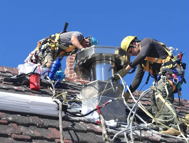 Protective chimney cap installed by Enfield Chimney Sweep in Enfield, CT