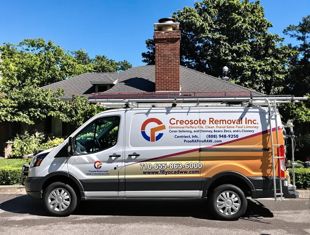 Enfield Chimney Sweep technician removing creosote safely in Enfield, CT